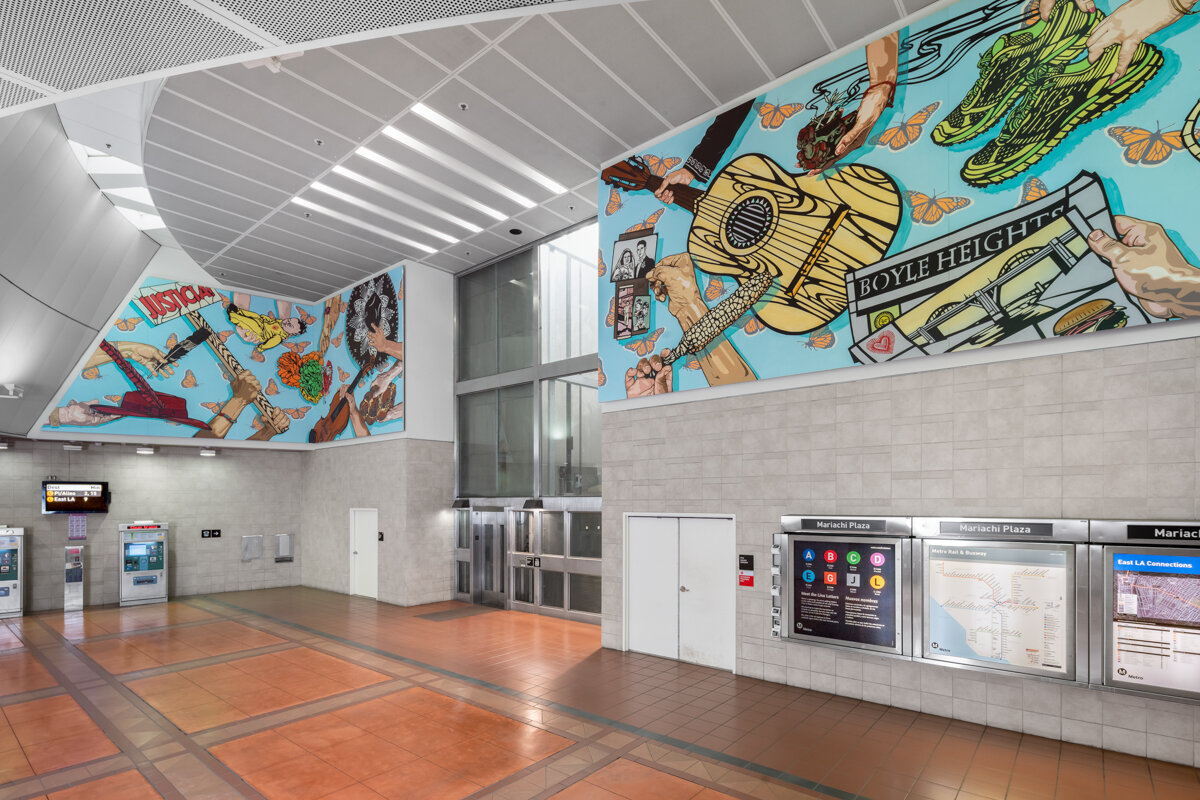 Interior of an LA metro station, showing Sonia Romero's mural