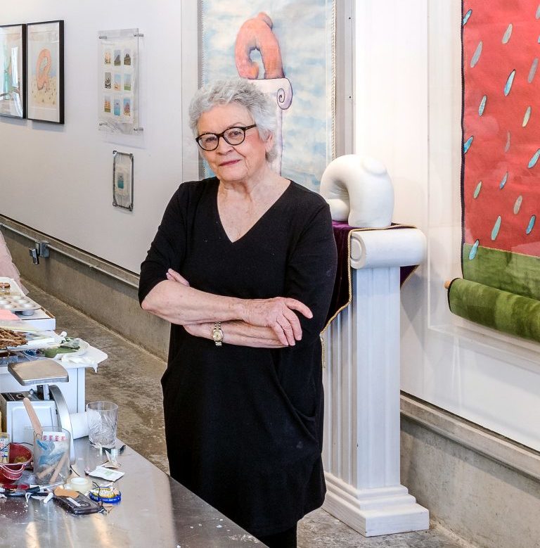 Image of Carol Cole Levin in an art gallery